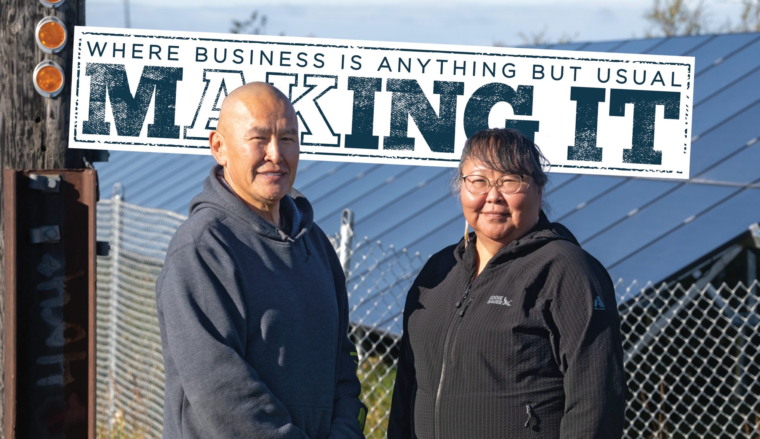 Napakiak Corporation with Lloyd and Tina Black in front of the village's solar panels