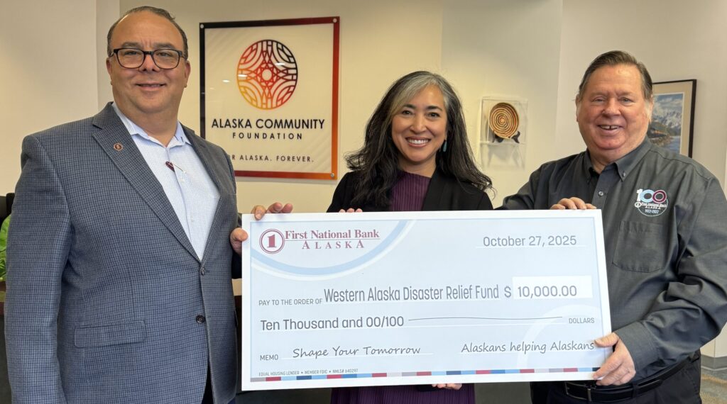 Donation presentation check for Western Alaska Relief Fund
